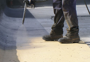 coating systems over Corona spray foam roof systems